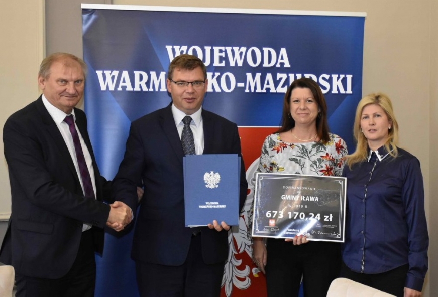 Gminę Iława reprezentował wójt Krzysztof Harmaciński, zaś Urząd Wojewódzki w Olsztynie wojewoda Artur Chojecki.